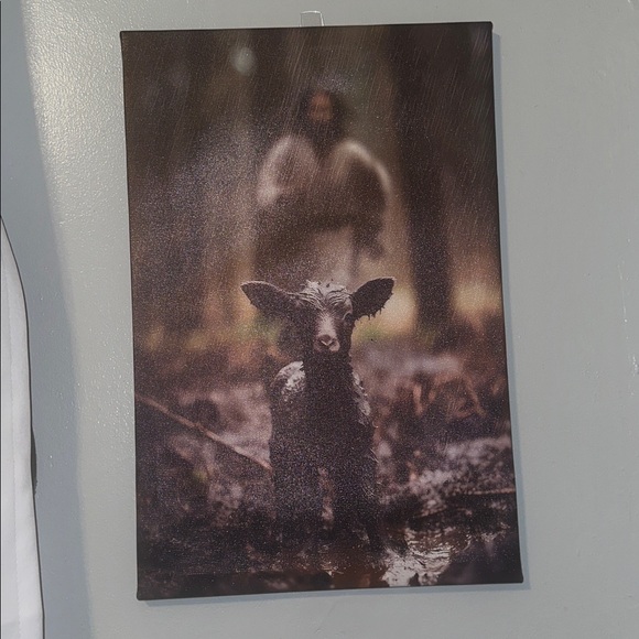 Jesus saving the lost black sheep in Rain Canvas Art 
18 X 23 - Picture 2 of 8